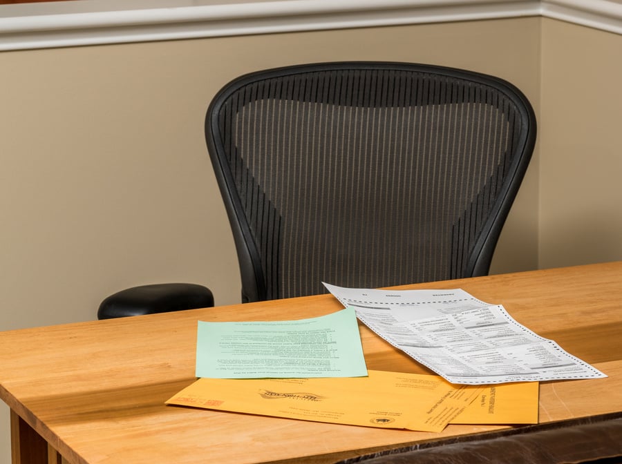 Desk with Paperwork for Absentee Voting Ballot in Presidential Election